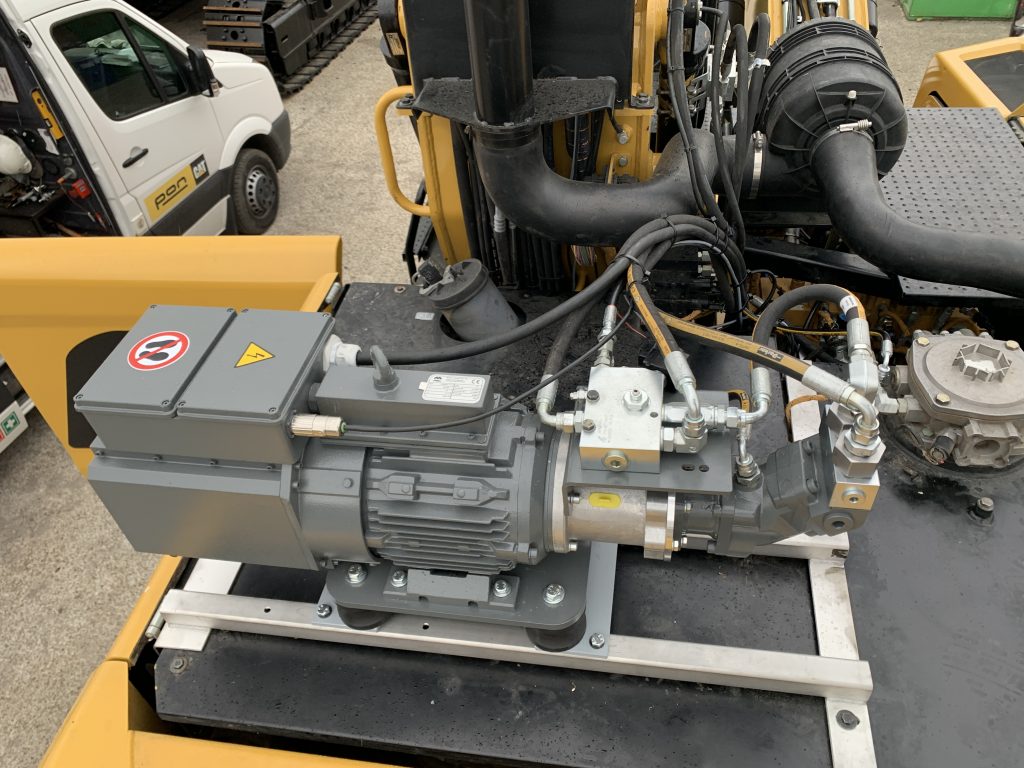 Magnetanlage auf einem CAT Bagger Hydramind Nachrustkits Mozelt Volvo Fuchs SANY