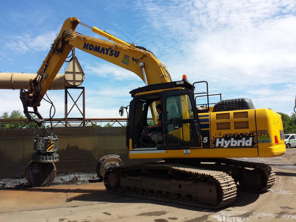 hydraulic Magnet with an excavator material handler generator Mozelt